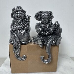 Cast Iron Christmas Stocking Holders  Girl And Snowman